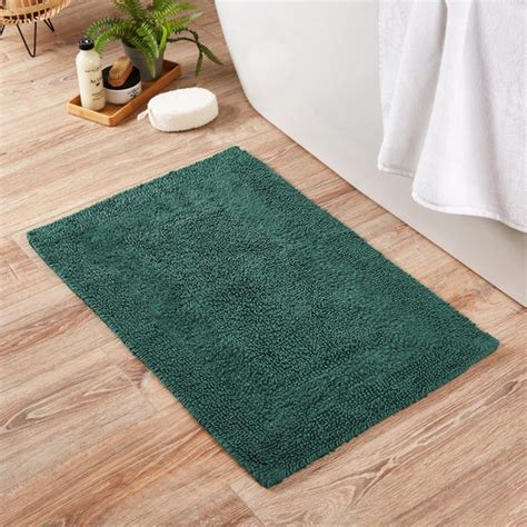 The Secret to a Luxurious Bathroom: A Plush Green Bath Mat