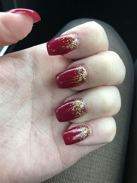 Red Ombre Nails with Gold Accents