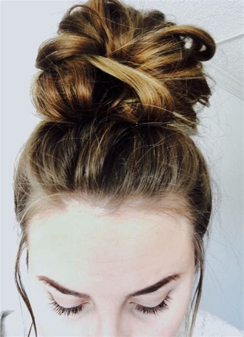 The Messy Top Knot: A Basketball Hairstyle for a Relaxed Look